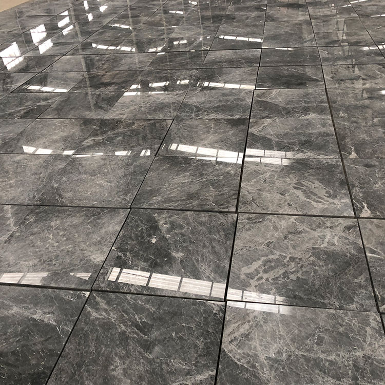 What are marble tiles made of, and how do they differ from other types of tiles?